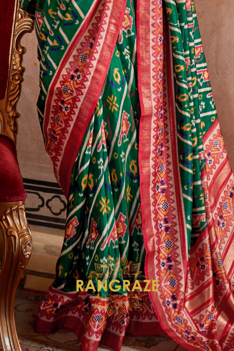 Majestic Emerald and Red Patola Silk Saree with Ornate Border