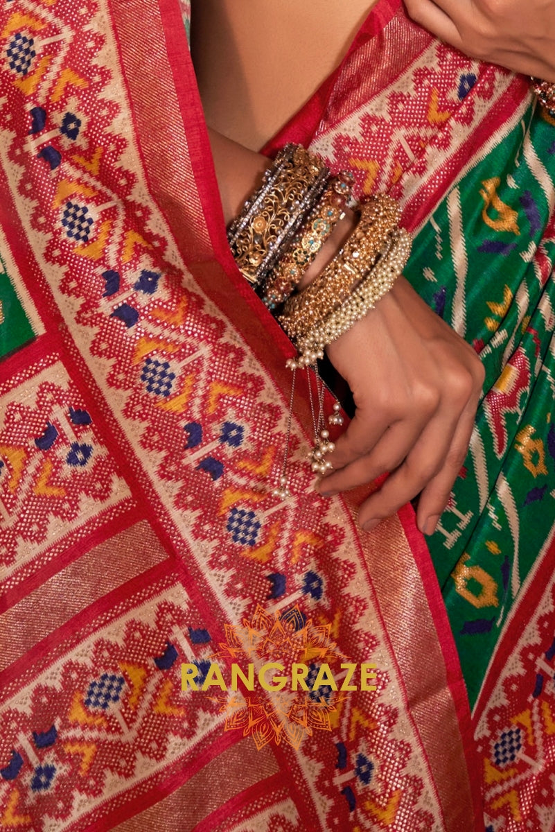 Majestic Emerald and Red Patola Silk Saree with Ornate Border