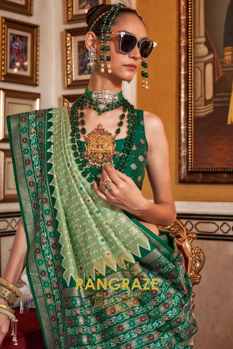 Celestial Sage Patola Silk Saree with Emerald Weaving Border