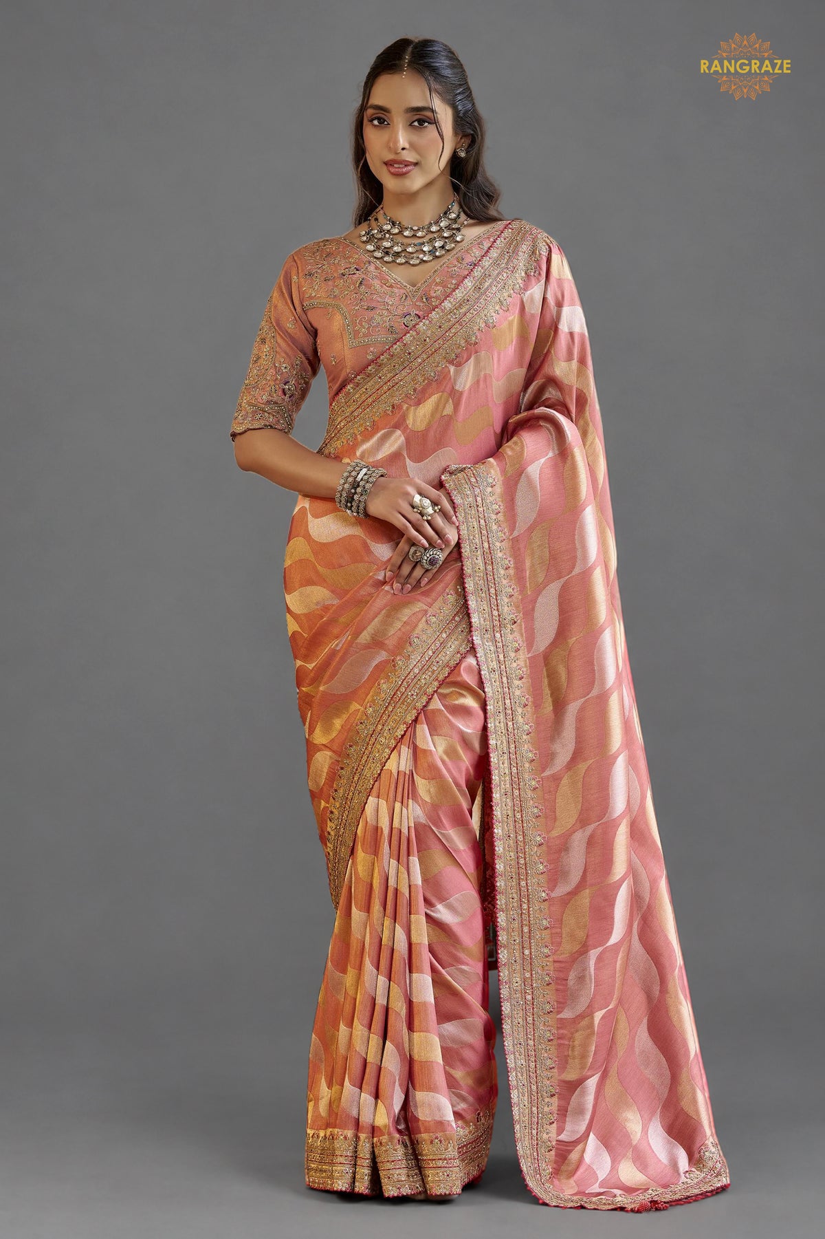Peach Embroidred Fancy Silk Saree