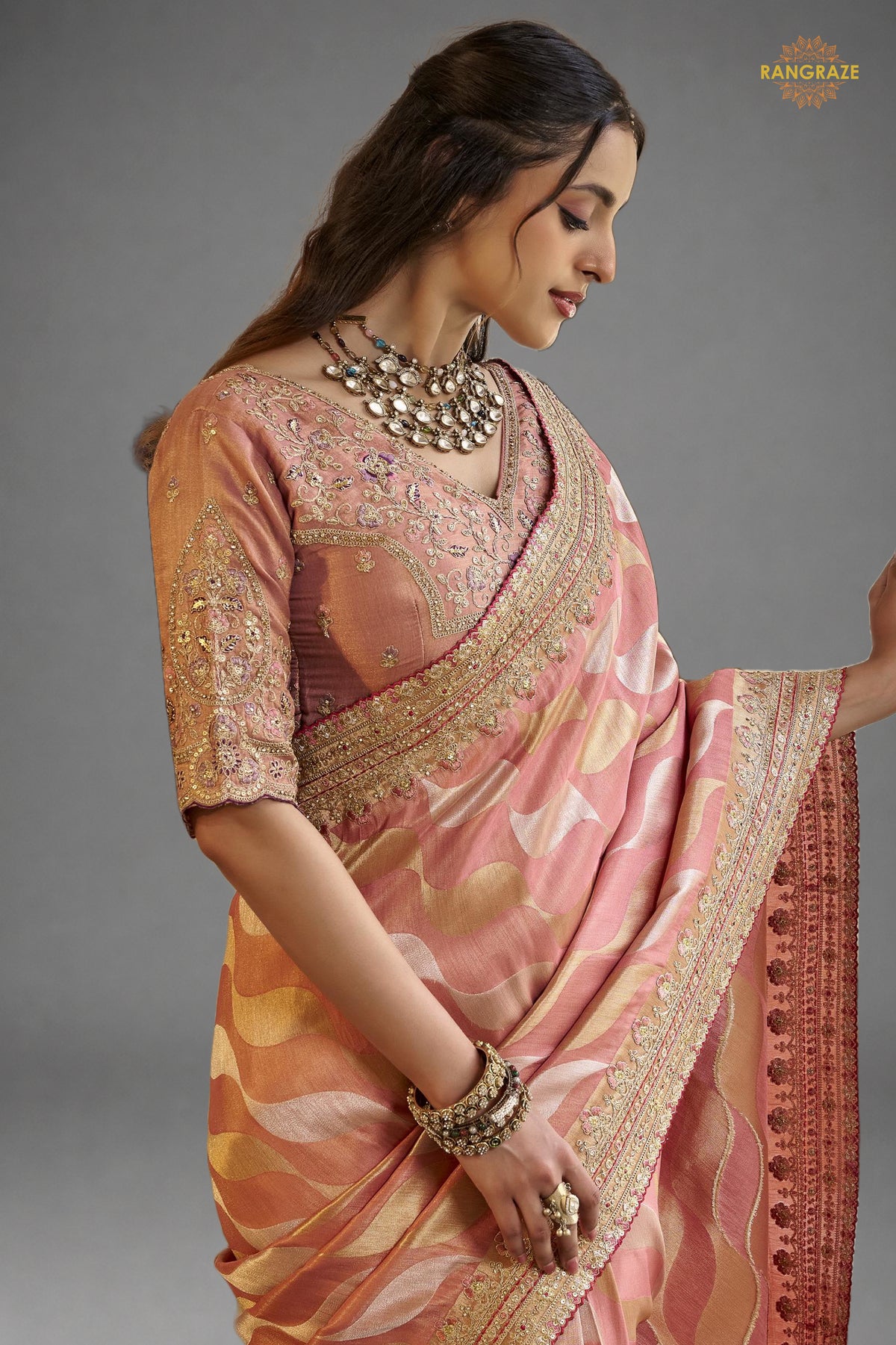 Peach Embroidred Fancy Silk Saree
