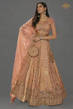 Peach Heavy Work Banarasi Silk Lehenga With Clutch