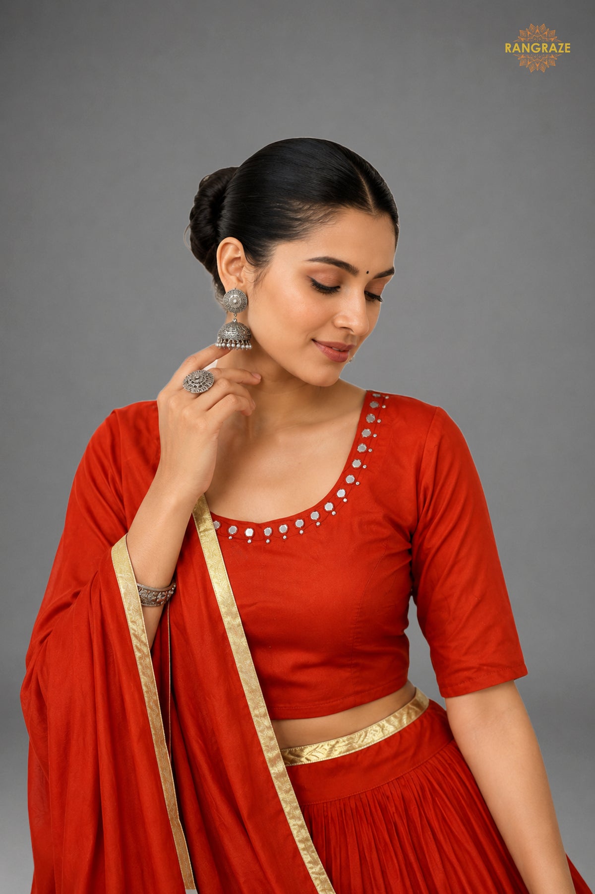 Red Tiered Flared Lehenga Choli with Real Mirror Work Neckline