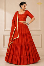 Red Tiered Flared Lehenga Choli with Real Mirror Work Neckline