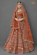 Rust Orange Heavy Embroidered Semi-Stitched Silk Lehenga