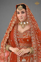 Rust Orange Heavy Embroidered Semi-Stitched Silk Lehenga