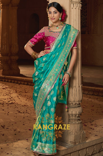 Turquoise Radiance Banarasi Silk Saree with Magenta Blouse