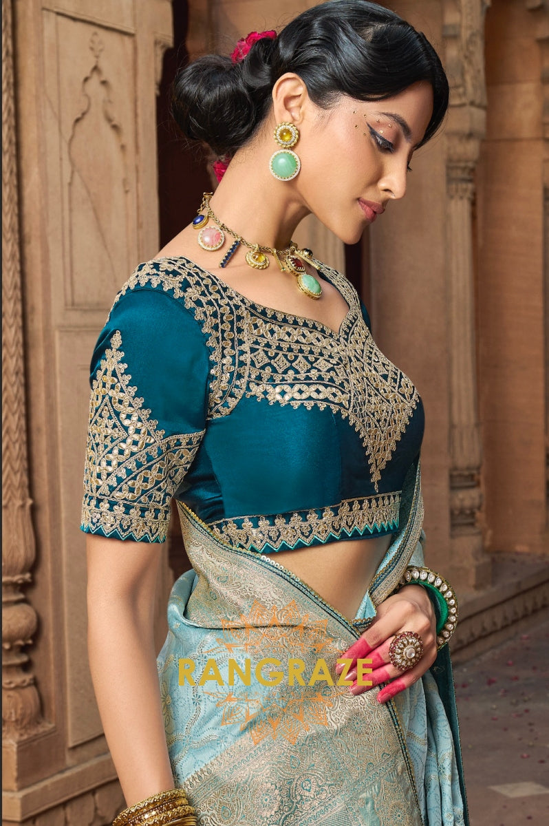 Aqua Blue Banarasi Silk Saree with Teal Embroidered Blouse