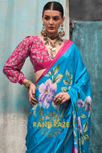 Vibrant Blue And Pink Floral Satin Crepe Saree