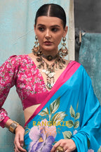Vibrant Blue And Pink Floral Satin Crepe Saree