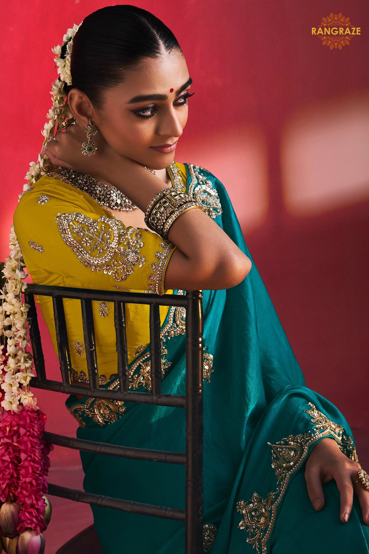Teal Green Embroidered Silk Saree With Designer Border