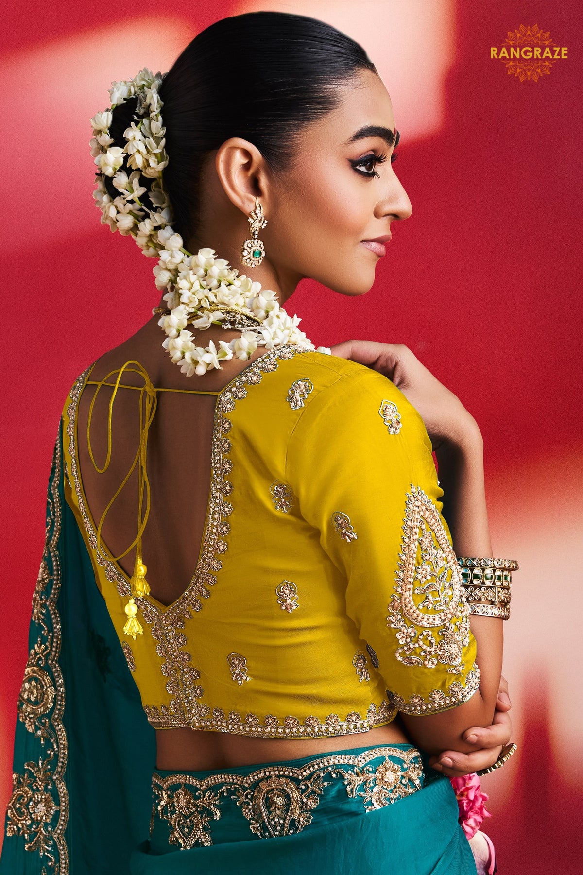 Teal Green Embroidered Silk Saree With Designer Border