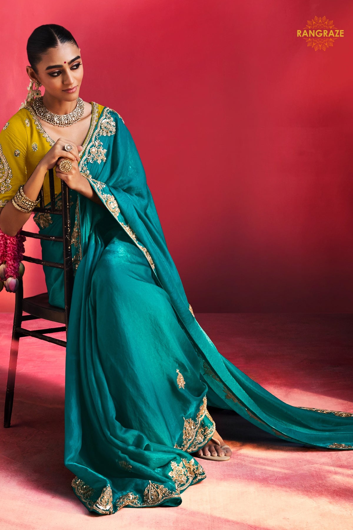 Teal Green Embroidered Silk Saree With Designer Border