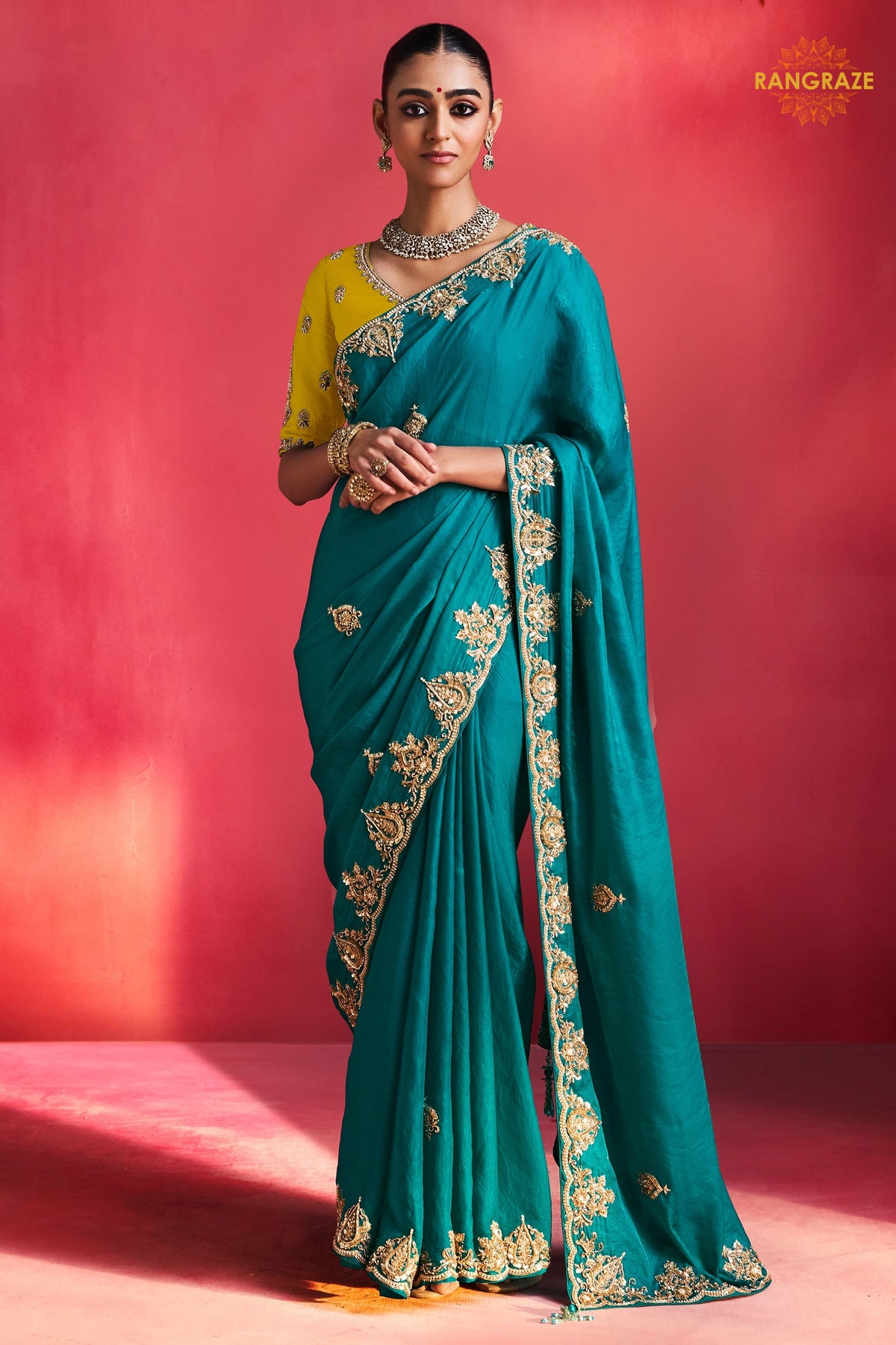 Teal Green Embroidered Silk Saree With Designer Border