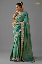 Teal Green Embroidered Viscose Tissue Saree