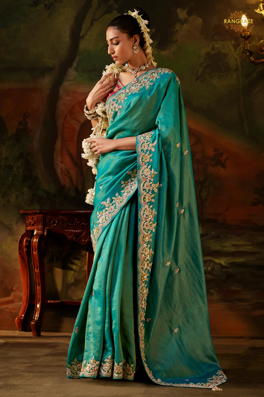 Teal Green Embroidered Viscose Tissue Saree