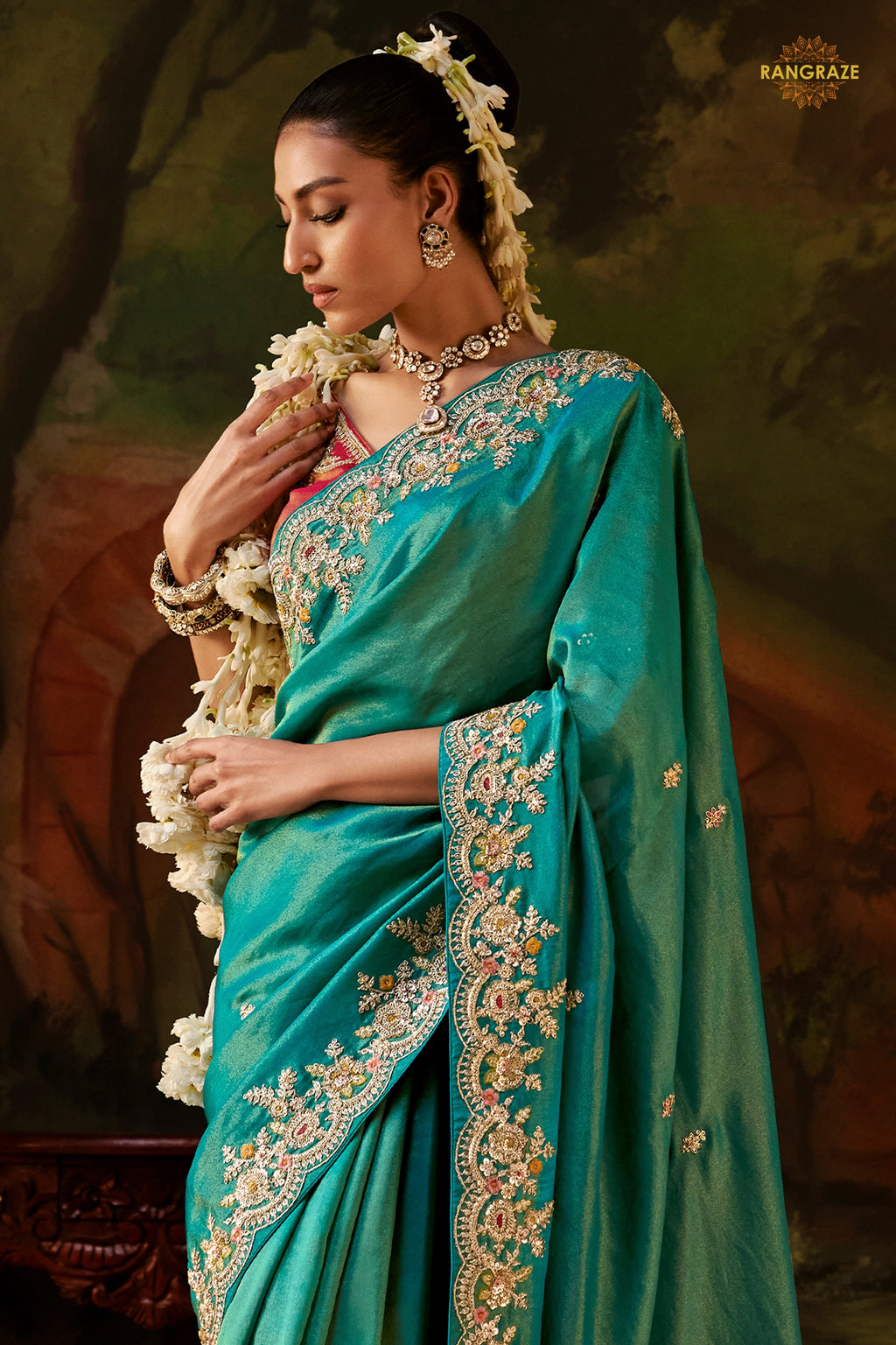Teal Green Embroidered Viscose Tissue Saree