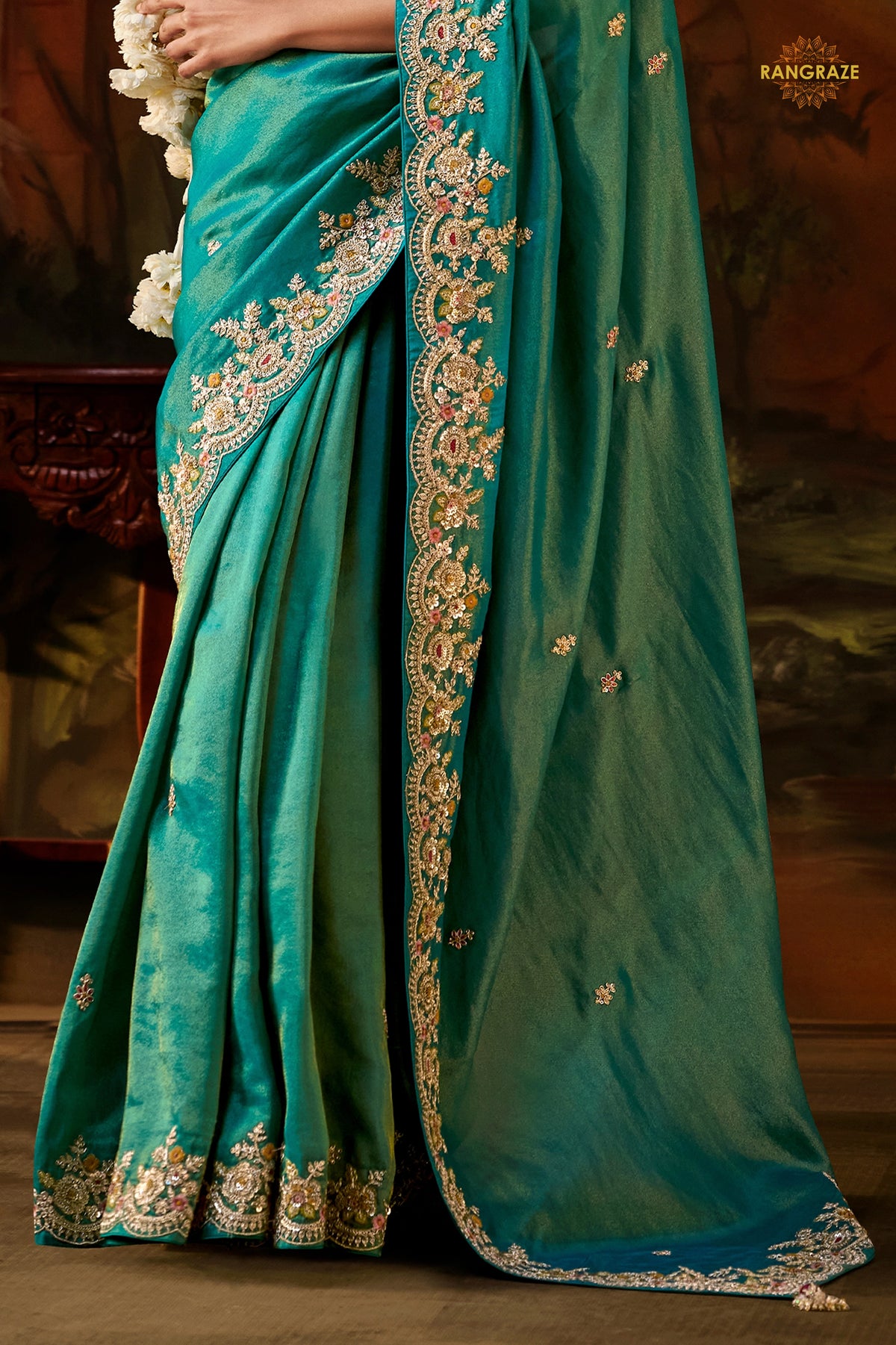 Teal Green Embroidered Viscose Tissue Saree