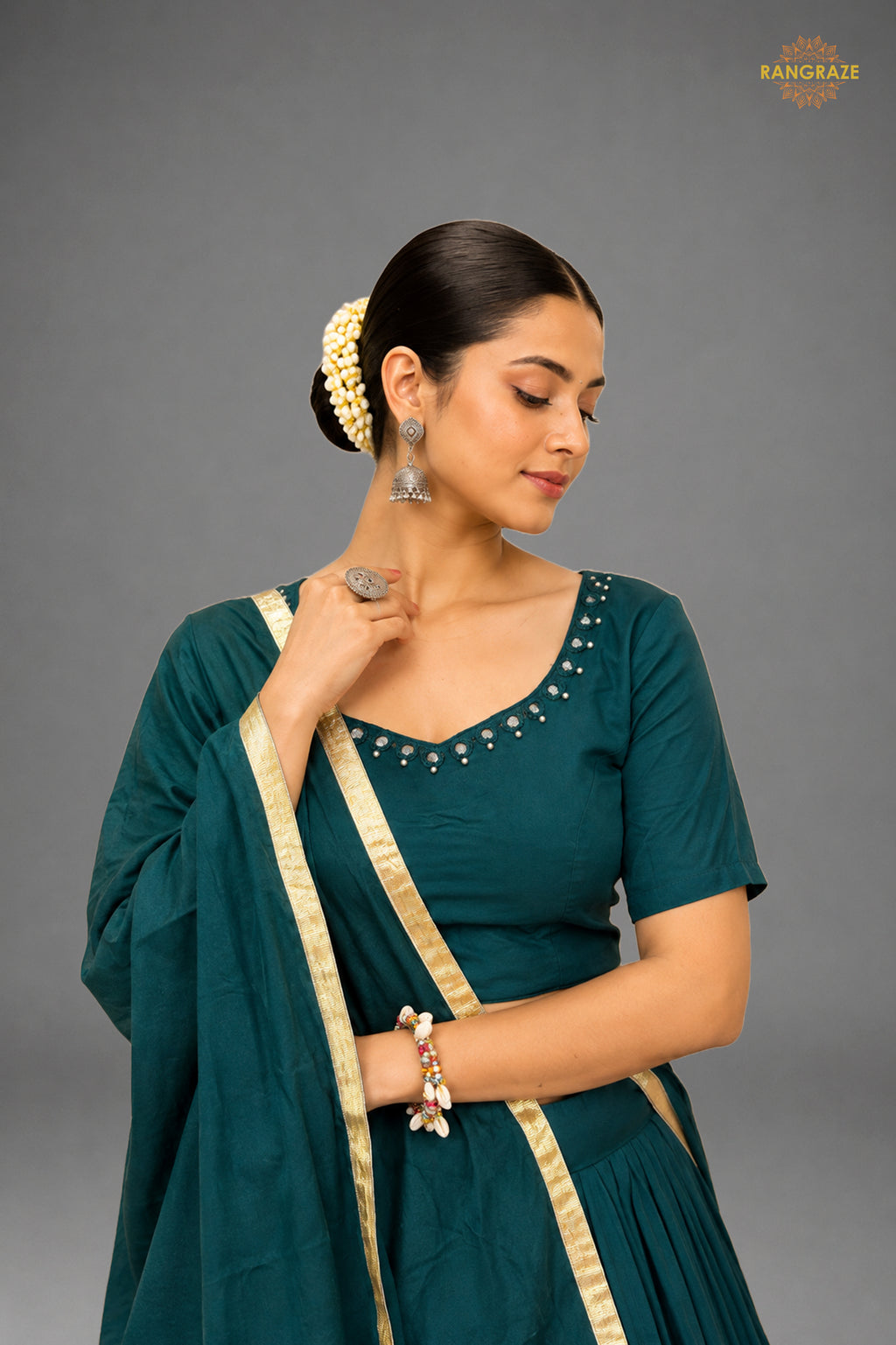 Teal Green Tiered Flared Lehenga Choli with Real Mirror Work Neckline