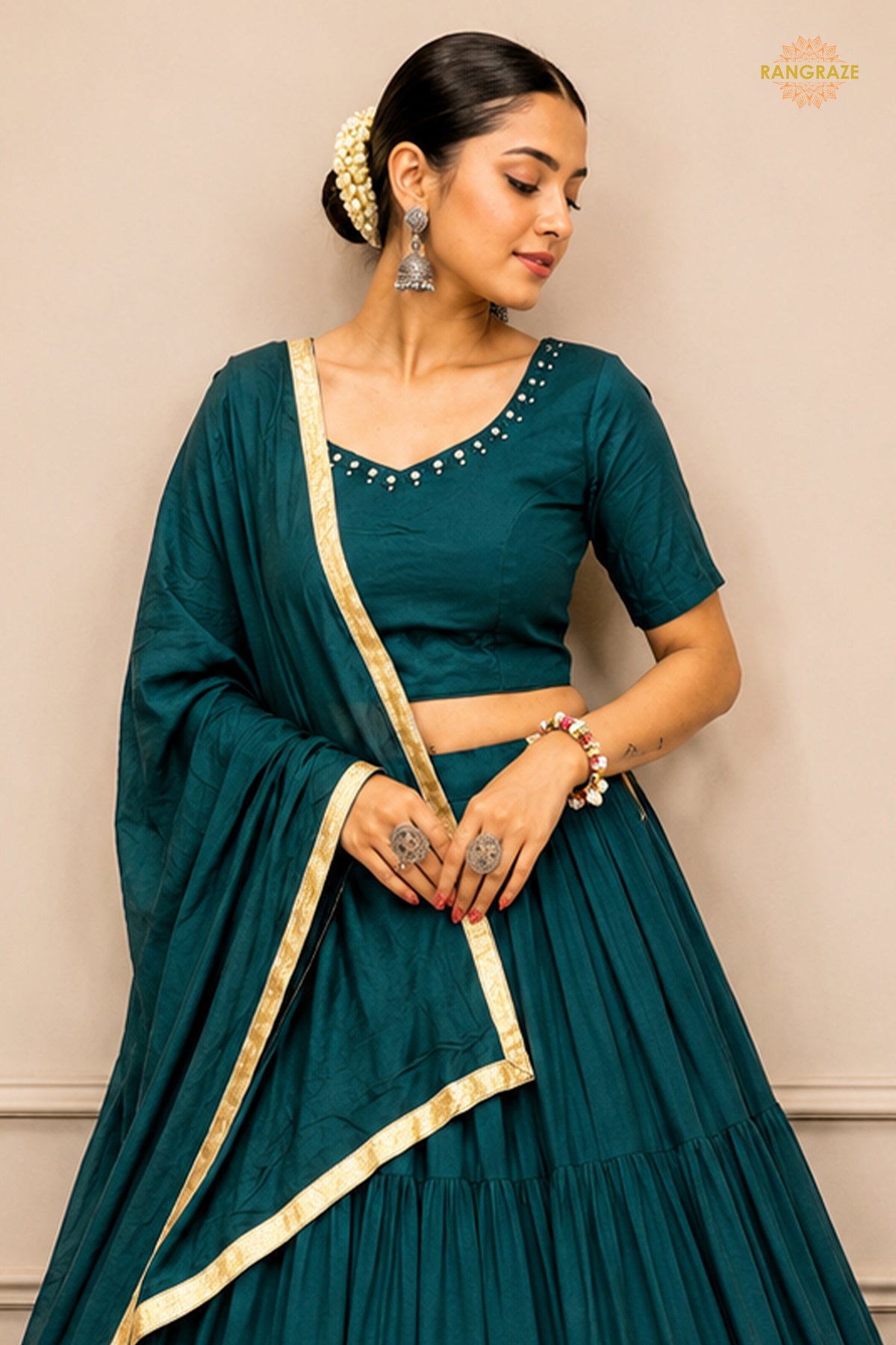 Teal Green Tiered Flared Lehenga Choli with Real Mirror Work Neckline