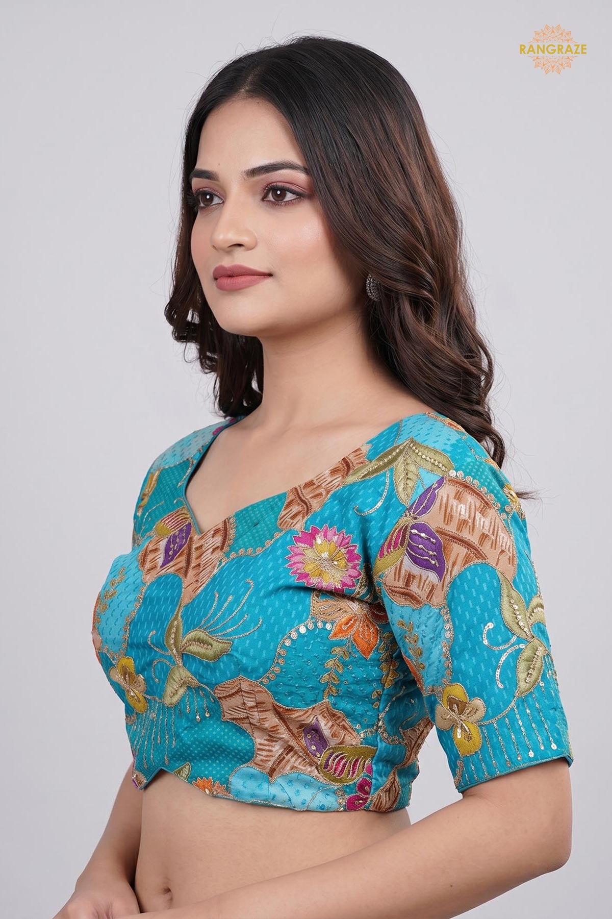 Turquoise Blue Printed Viscose Blouse with Embroidered Work
