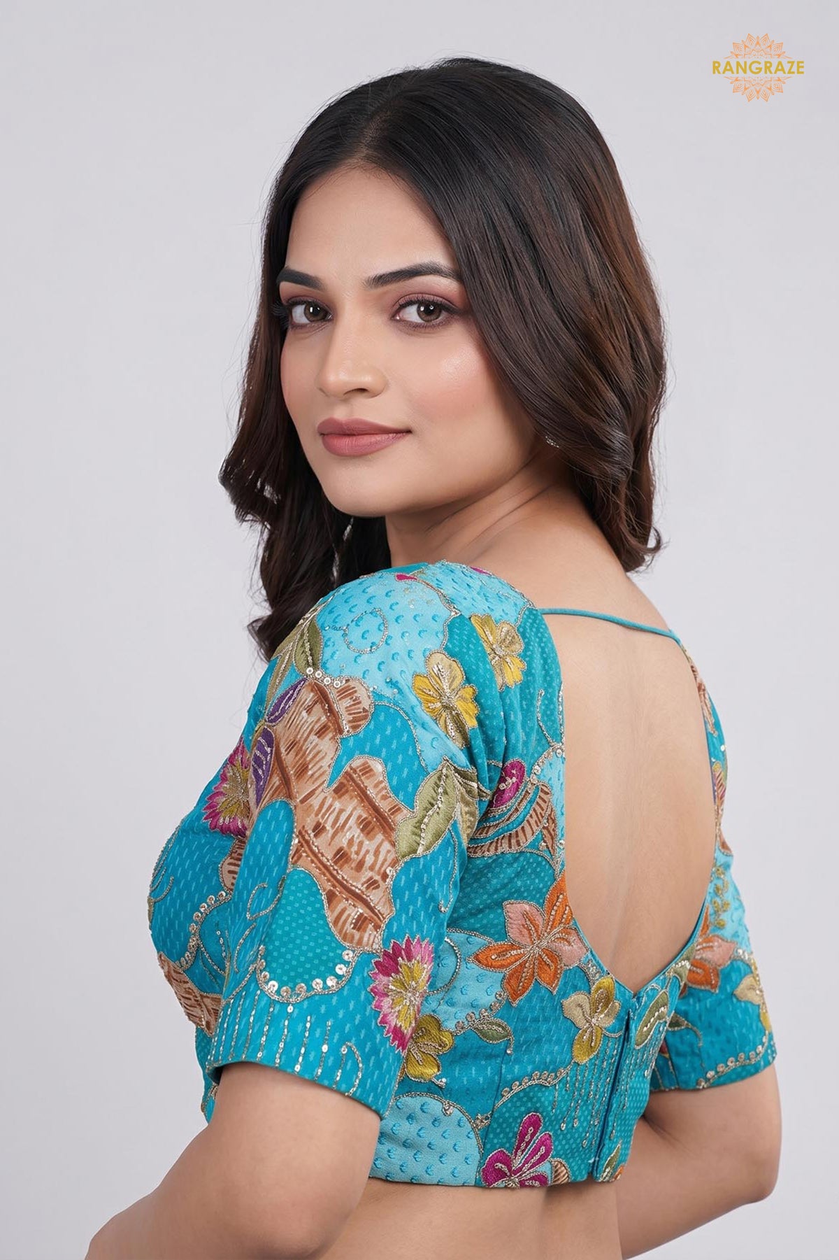 Turquoise Blue Printed Viscose Blouse with Embroidered Work