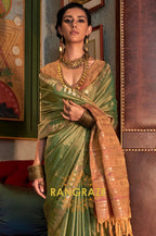 Pistachio Green Tussar Silk Saree with Copper Border