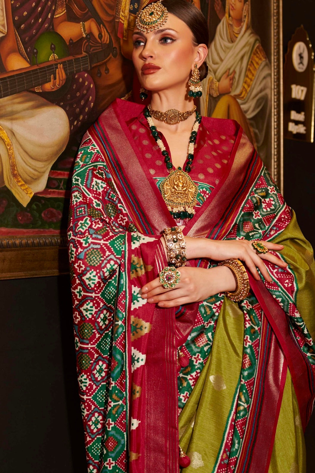 Mehendi Green and Crimson Patola Grandeur: Silk Patola Saree