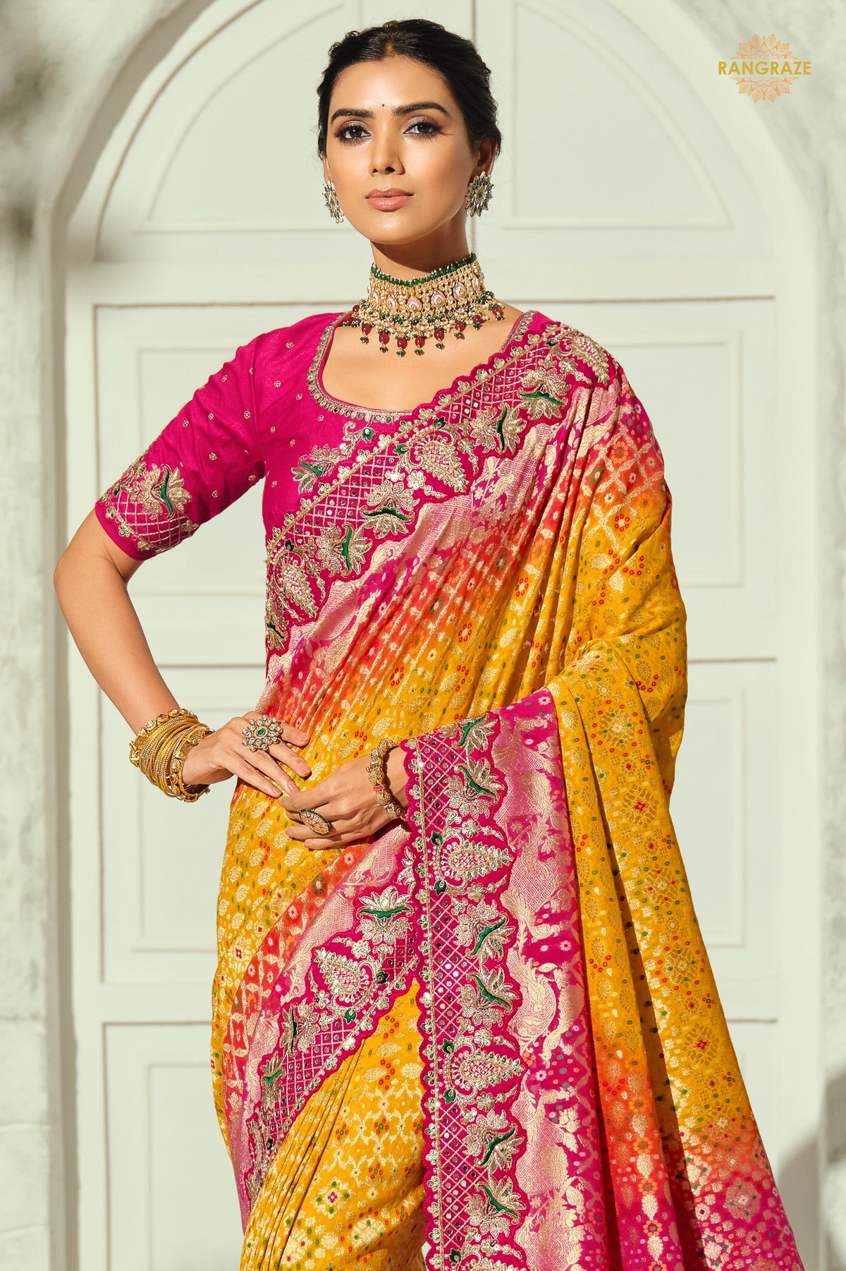 Yellow And Pink Embroidered Bandhej Georgette Saree