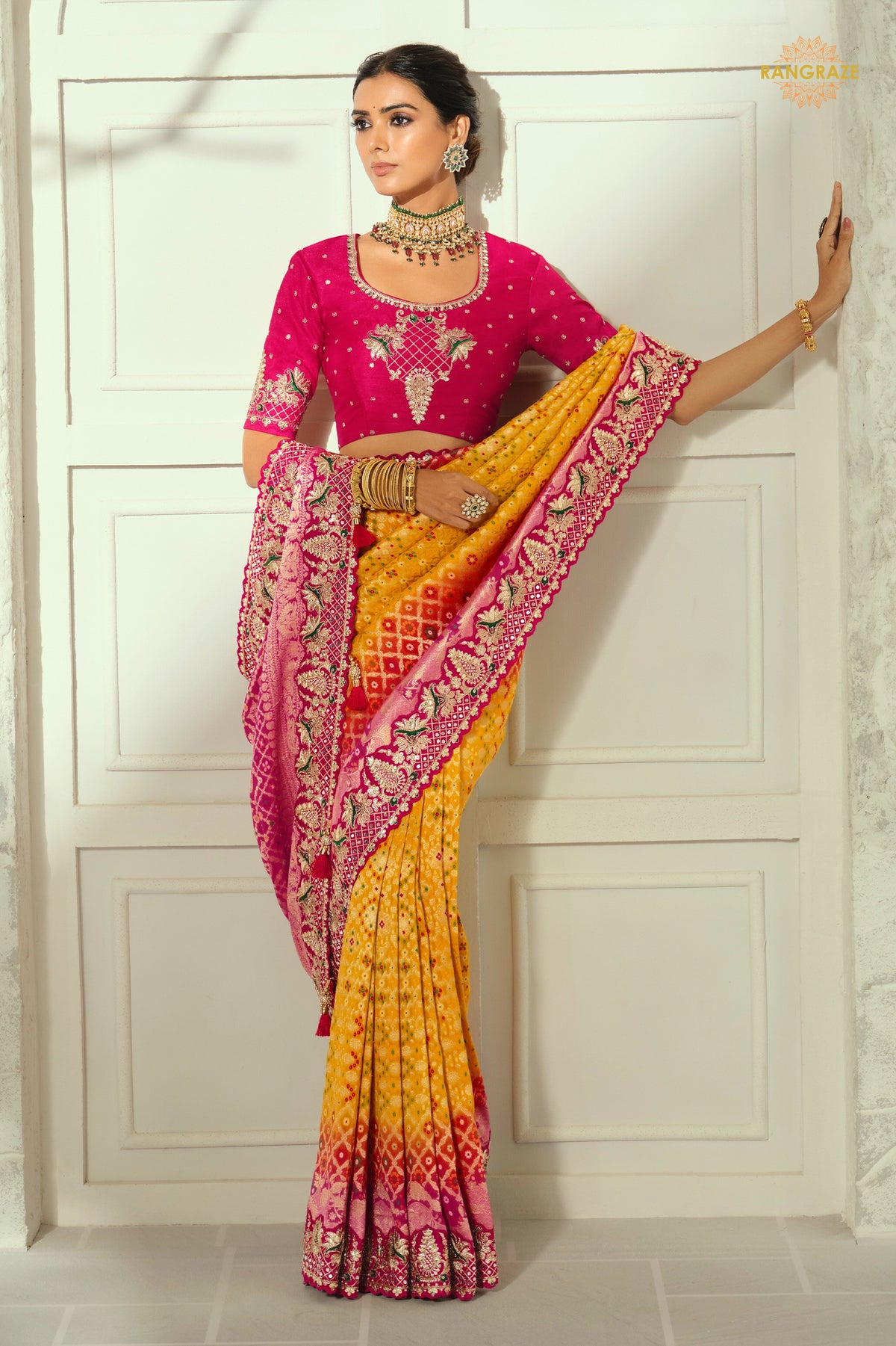 Yellow And Pink Embroidered Bandhej Georgette Saree