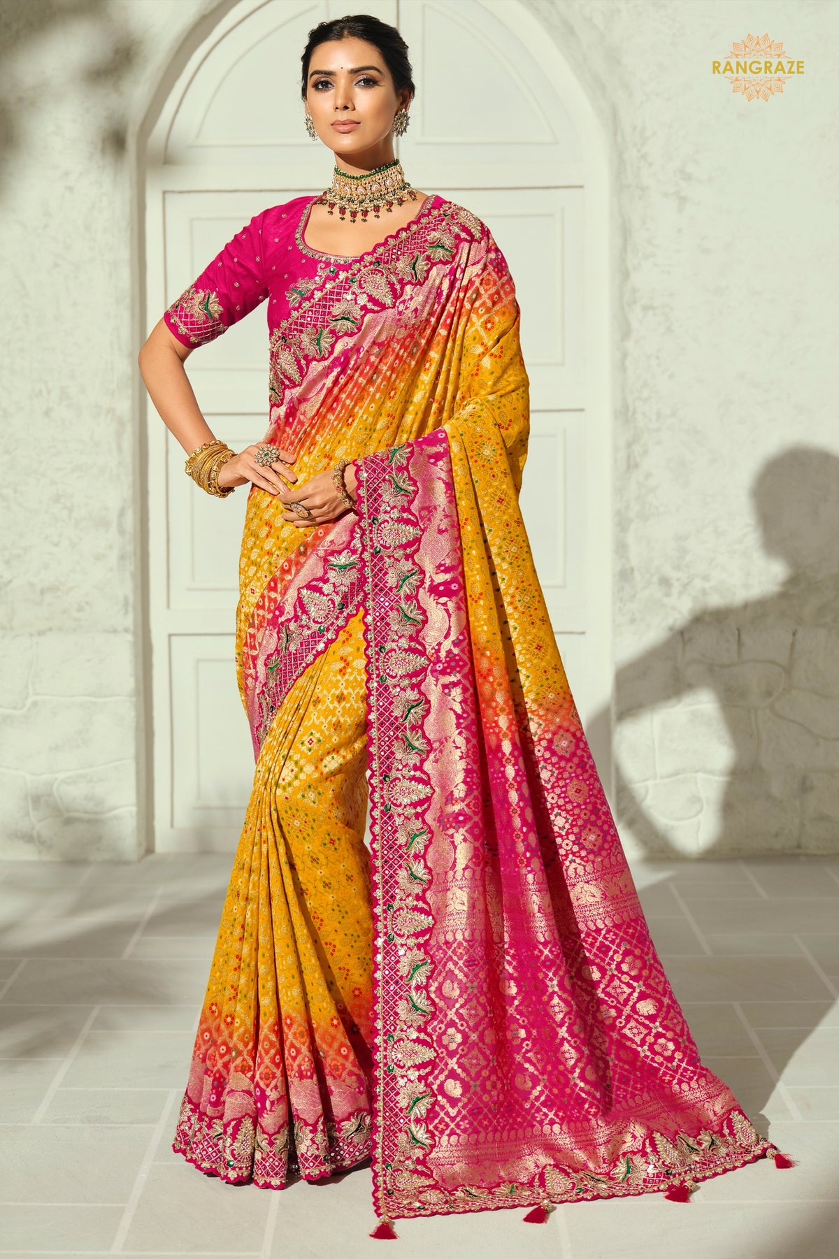 Yellow And Pink Embroidered Bandhej Georgette Saree