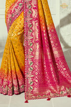 Yellow And Pink Embroidered Bandhej Georgette Saree
