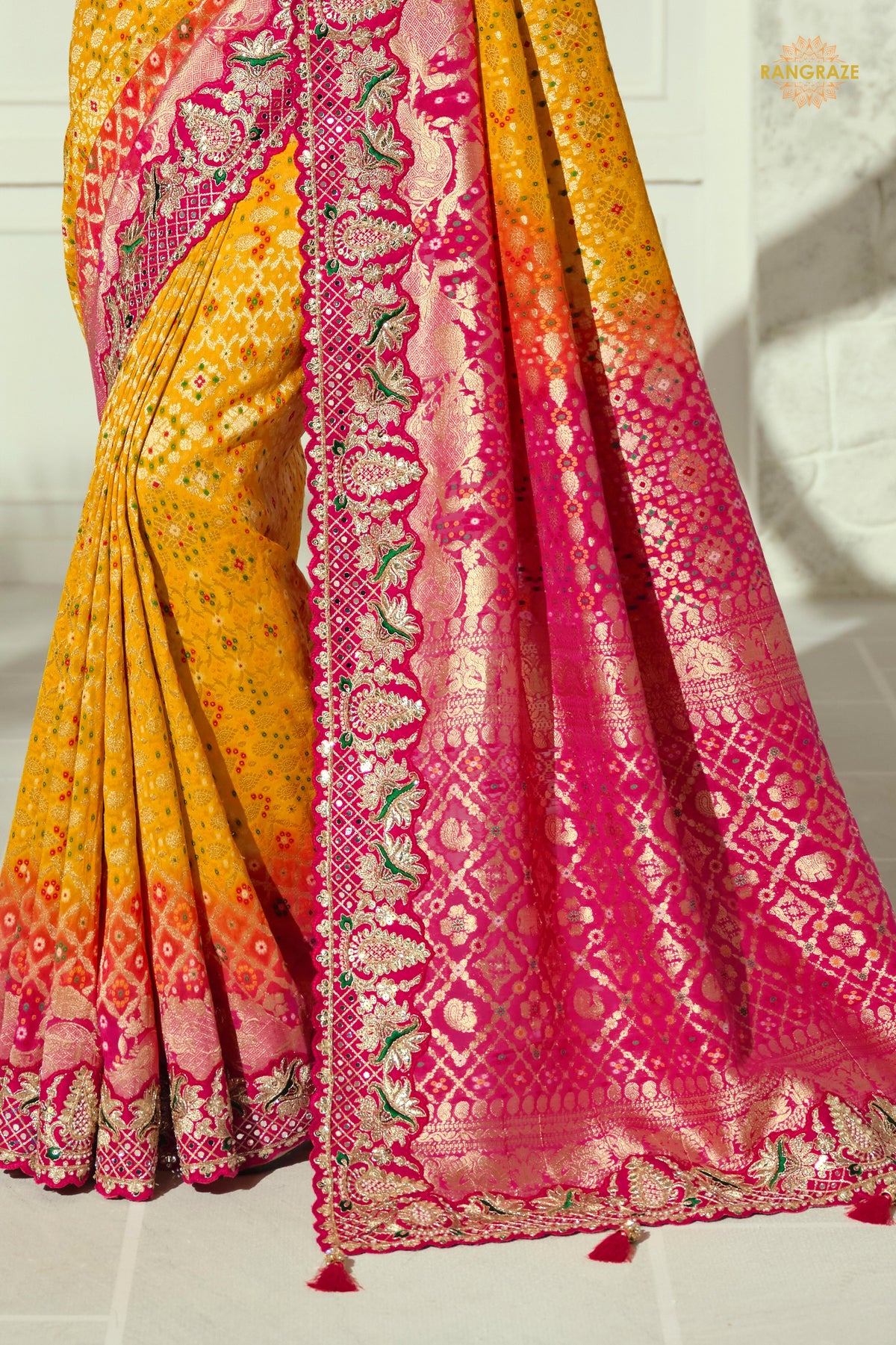 Yellow And Pink Embroidered Bandhej Georgette Saree