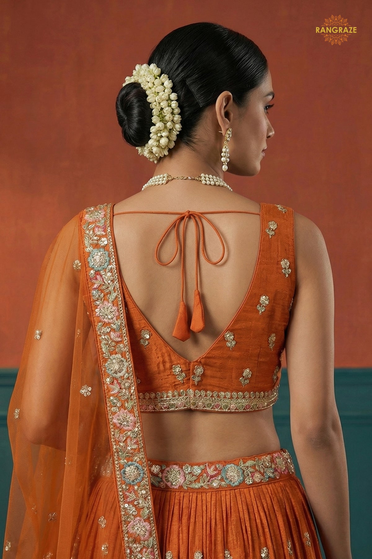 Orange Embroidered Semi-Stitched Georgette Lehenga Set