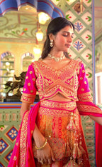Pink And Yellow Banarasi Silk Lehenga WIth Hand Purse